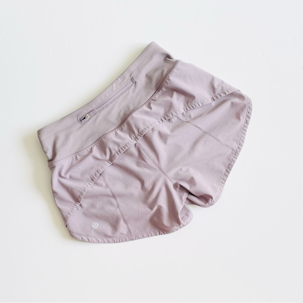 Lululemon SIZE 2 TALL Speed Up 4” MR midrise shorts in mauve pink